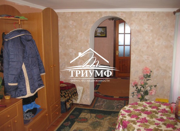 Дом по улице Кооперативная (Мельницы)