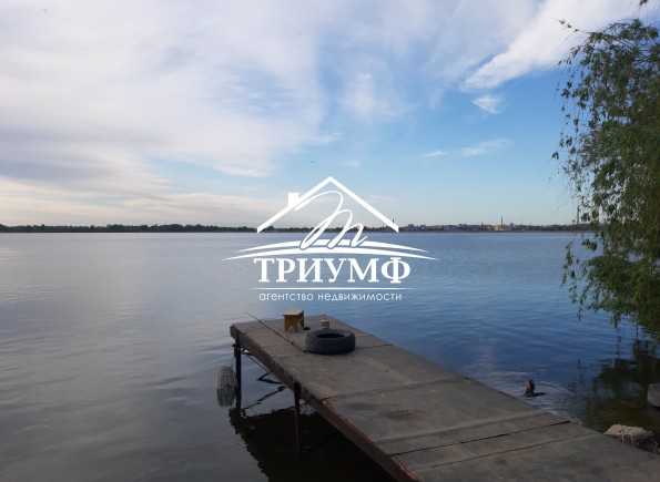 Земля под застройку на Острове с выходом на воду.