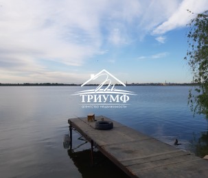 Земля под застройку на Острове с выходом на воду.