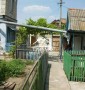 Дома часть в Центре со своим приватизированным участком.