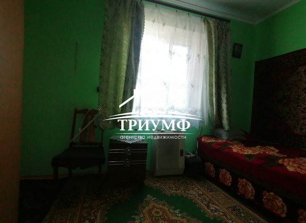 Добротный дом с участком на Острове.