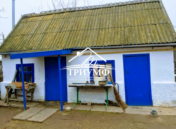 Дом в Белозерке по центральной улице